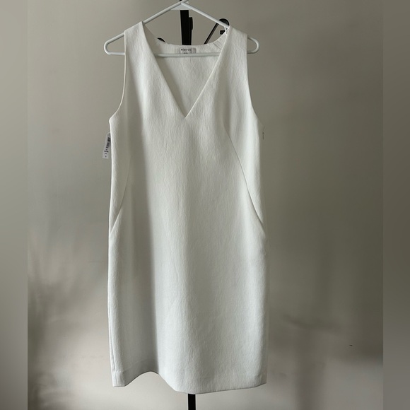 Babaton Dresses & Skirts - Aritzia Babaton Louie V-Neck Sleeveless Dress, Size 8, Colour White Espace.
